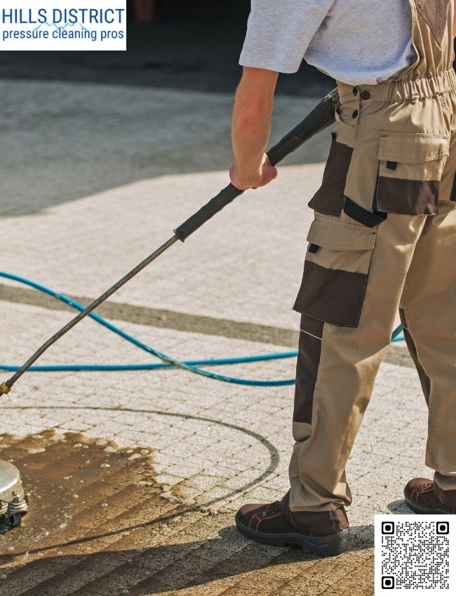 Can pressure cleaning remove oil stains from driveways?